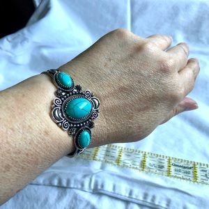 Turquoise costume stones with silver cuff
